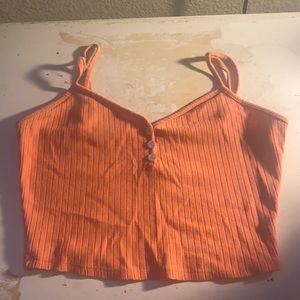 this orange shirt, size small. crop-top.